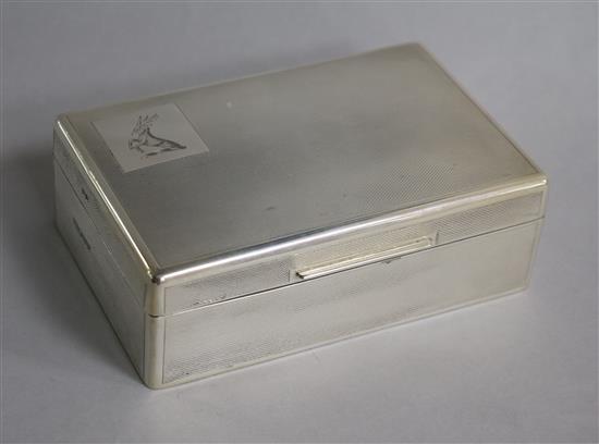 A late 1950s engine turned silver rectangular cigarette box, Mappin & Webb, 1959, 14cm.